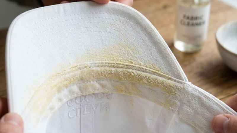 white baseball cap with sweat stains