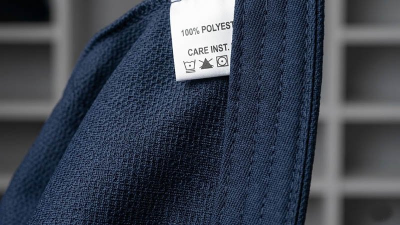 Close-up texture of polyester hat fabric showing the material structure