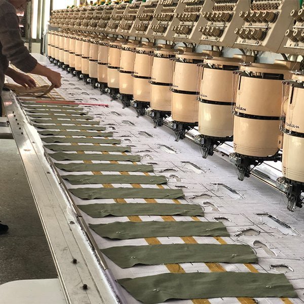 Professional embroidery machines in operation