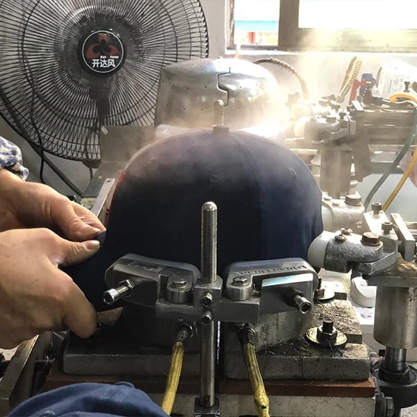 Cap shaping and pressing machines