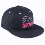 Black embroidered hip-hop cap with pink snapback closure