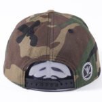 Camouflage embroidered snapback cap with structured crown and flat visor