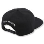 Black flat brim snapback cap with custom embroidered text