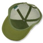 Green cotton mesh trucker hat with sewn woven label logo